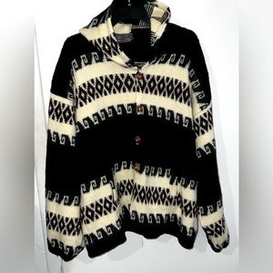 Vintage wool knitted sweater jacket with wooden buttons and pockets. See photos